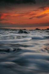 Long exposure of sea waves during sunset