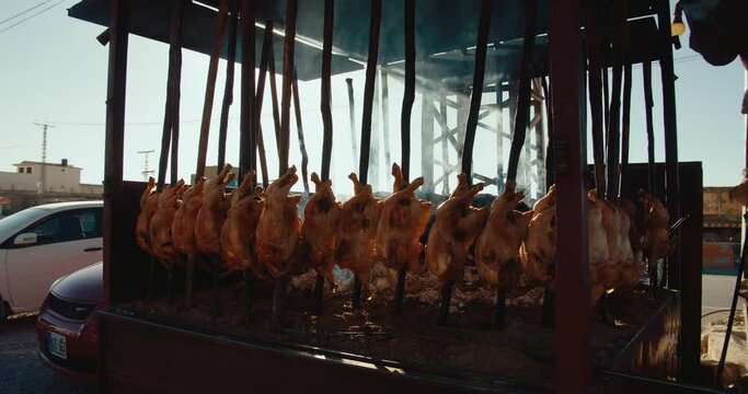 Chicken roast in a big grilling machine, cart captured in a street in Quetta, Pakistan