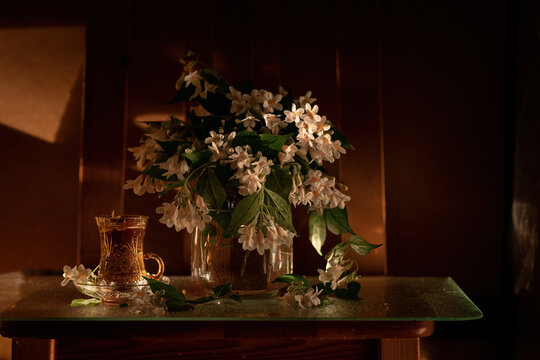 Still Life with Spring Flowers in the Setting Sun