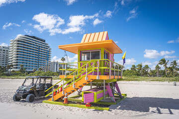 Miami Beach, USA - December 8, 2022. View of classic colored art deco lifeguard tower in South Miami Beach - 606007085