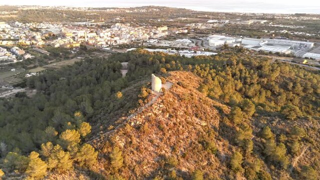 Beautiful aerial view of Torre Cucurull on the top of the hill in Roda de Bera, Spain