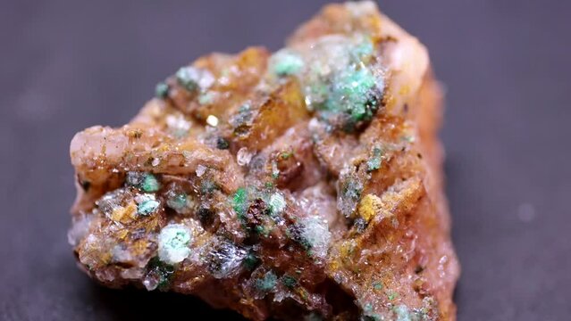 Macro shot of Siderite mineral from Spain on purple background