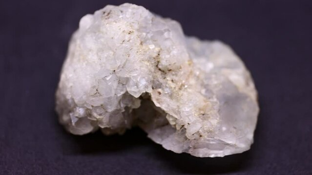 Macro shot of Celestine mineral from Madagascar on purple background