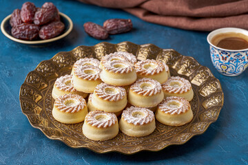 Middle eastern sweets. Traditional Eid al Adha , Eid al Fitr semolina maamoul or mamoul cookies with dates. Close up