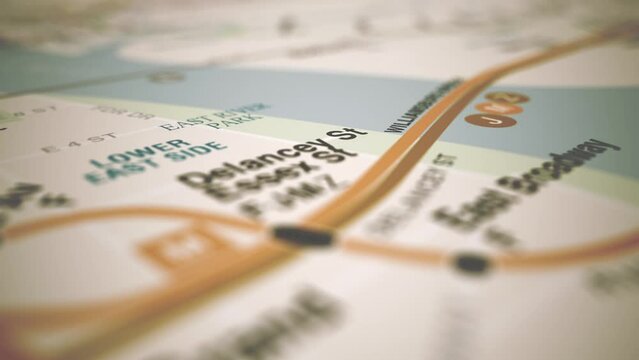 Flight Over Subway Map Background/ 4k animation of a vintage background of flight over a city subway map with depth of field blur
