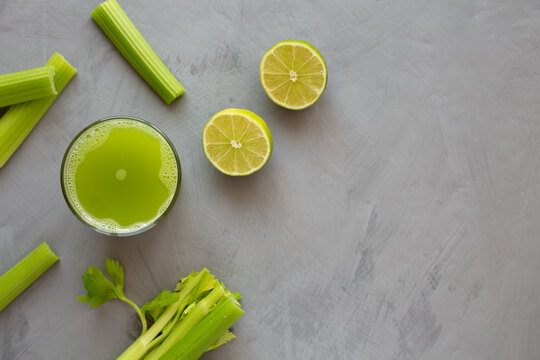 Refreshing Organic Celery Juice With Lime In A Glass, Top View. Flat Lay, Overhead, From Above. Copy Space.