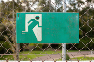 White and green running sign