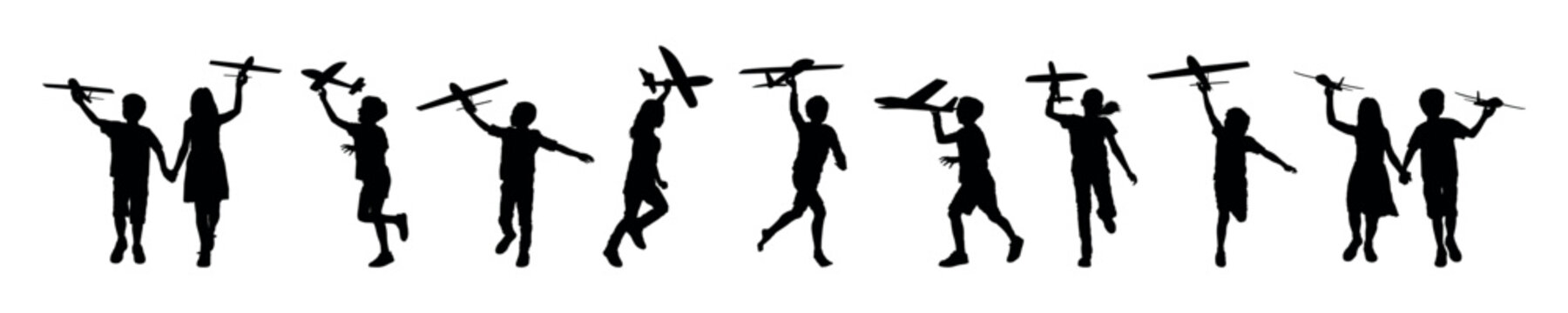 Group of kids playing toy airplane silhouette set collection. Children holding airplane toy silhouette collection.