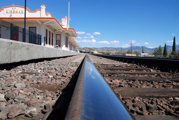 Kingman railway station with shiny railway track in the foreground