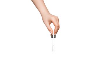 Female hand on a light background with a pipette.