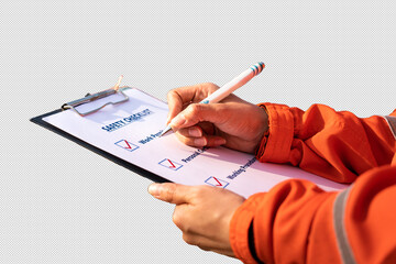 Action of a safety officer is writing on paper clipboard durinf perform audit and inspection and construction work site, industrial working scene. Isolated on green and applied with clipping path.
