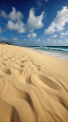 Fototapeta na wymiar Footprints on the beach. Sand beach and blue sky. Beach in the morning. Sand beach and sky.