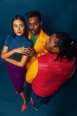 Obraz premium Asian trio colour blocked fashion studio portrait