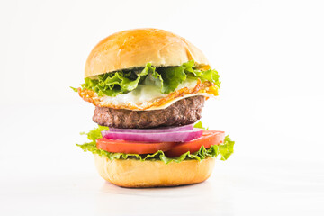 Delicious juicy grilled burger on wheat buns.  Studio macro shot.Food Feast Party.