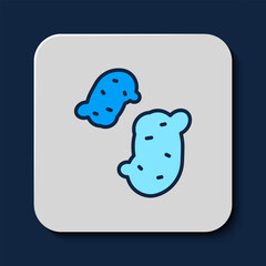 Filled outline Potato icon isolated on blue background. Vector