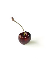 Ripe fresh black cherries isolated on white background.