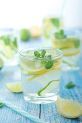 Glasses with lemon and lime lemonade