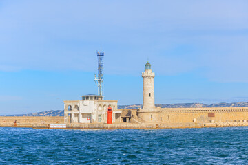 A scenic view of the lighthous and communication center of the port of Marseille, bouches-du-rhône, France under a majestic blue sky