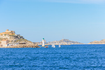 A scenic view of the entrance of the port of Marseille, bouches-du-rh&ocirc;ne, France under a majestic blue sky