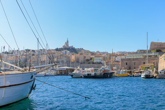 A scenic view of the old port (vieux port) of Marseille, bouches-du-rh&ocirc;ne, France under a majestic blue sky
