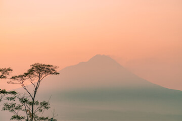 Mount Merapi close up view of the sunrise. Mount Merapi is a mountain located in Indonesia. The most active volcano in Indonesia