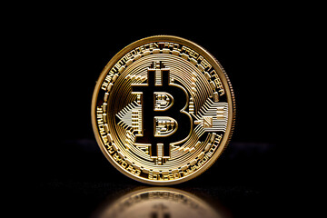 Bitcoin gold coin black background