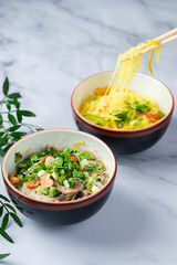 Lunch Funchoza with mushrooms, cashew nuts, carrots and green onions.