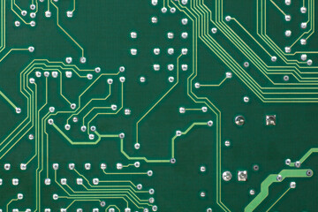 Macro Closeup Computer Electronic Circuit board PCB with traces and solder pads