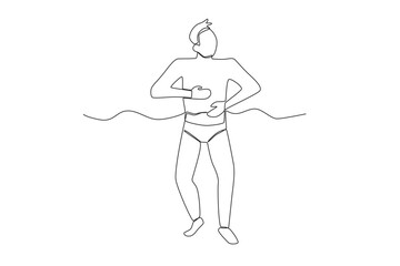 A man getting ready to swim on the beach. Swimming in beach one-line drawing