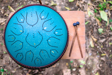 Close-up of hands playing Tongue drum, Vadjraghanta or hand pan