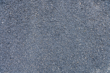 Small gravel as a background. Granite gravel background. Building stone. Banner design