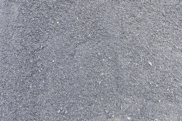 Small gravel as a background. Granite gravel background. Building stone. Banner design