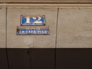 Street number plate of a building in Madrid. Madrid Spain.
