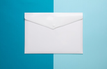Plastic white envelope on a blue background