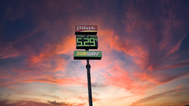 Blinking Pilot gas station sky sign current diesel gas prices March 2022