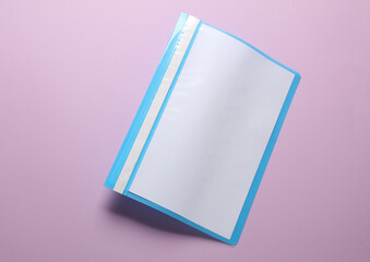 Plastic folder with paper sheets on a purple background. Business mockup