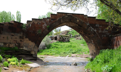 Fototapeta na wymiar Emir Bayindir Bridge, located in Ahlat, Turkey, was built in the 15th century.
