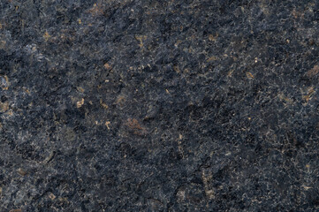 Granite surface as background. Grunge stone texture. Basalt. Rock surface background