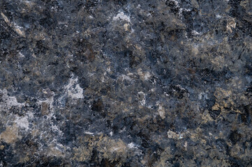 Granite surface as background. Grunge stone texture. Basalt. Rock surface background