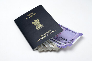 Indian passport and indian currency notes together.