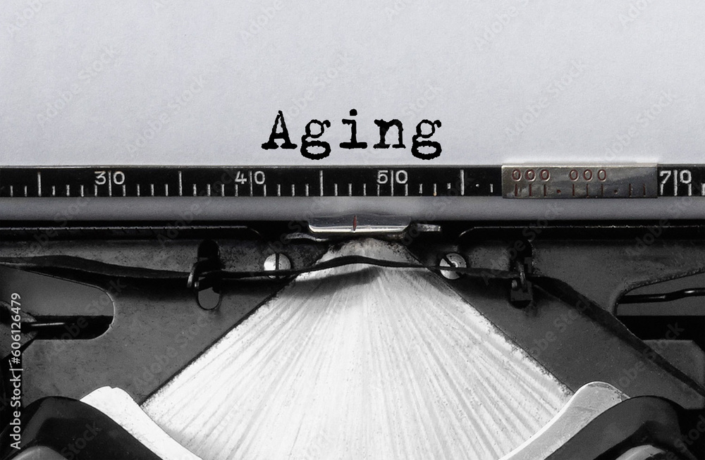 Aufkleber text aging typed on retro typewriter