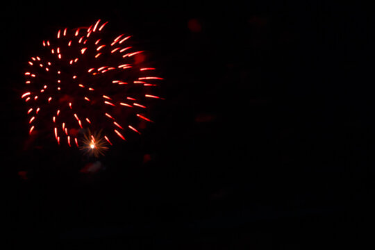 Pink Firework Sparks Bright On Black Night Sky.copy Space