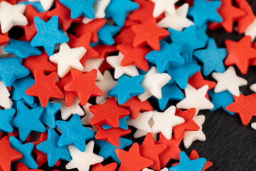 small star shaped confectionery decorations, close up