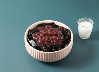 Red Bean Panna Cotta served in bowl isolated on background top view of taiwan food
