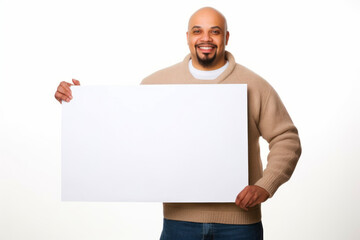 Portrait of a happy african american man holding a blank sheet of paper