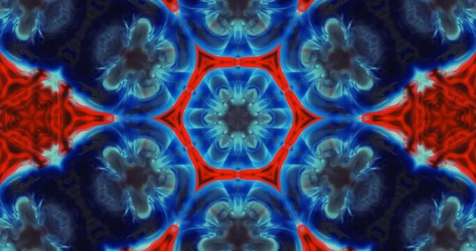 Abstract original colorful kaleidoscope in blue, red tones on a black background. Abstract background.