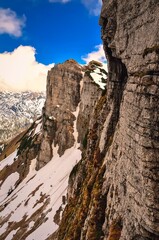 Mountain landscape in Austrian Alps. View from Loser peak over steep rocky wall, Dead Mountains (Totes Gebirge) in Austria.