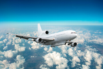 Fototapeta na wymiar Passenger airplane in the clouds. 