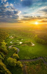 Beautiful spring morning over the forest and river - drone aerial view