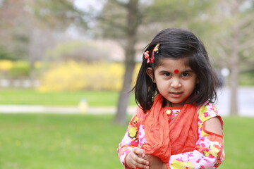 Picture of young girl looking at the camera